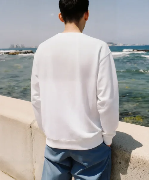 Tranquil Ocean Mockup Featuring a Casual Sweatshirt