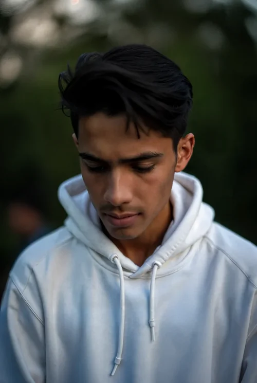 Mockup of Hoodie Against Soft Green Background Colors