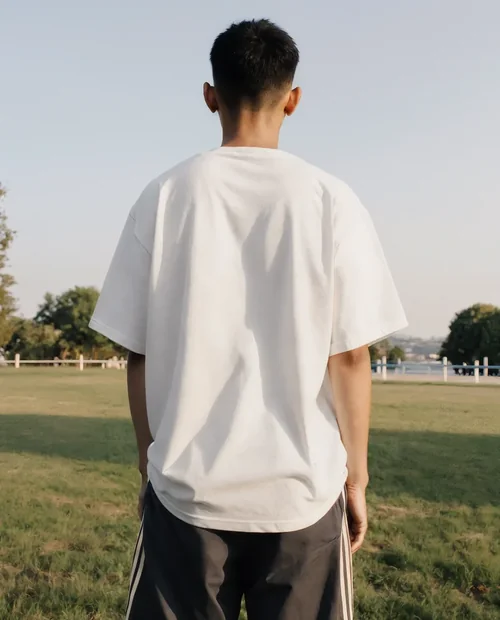 Casual T-Shirt Mockup in a Sunny Park Setting