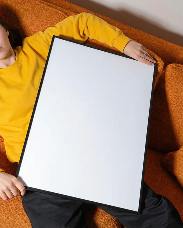 Vibrant Mockup of a Relaxed Person with Poster