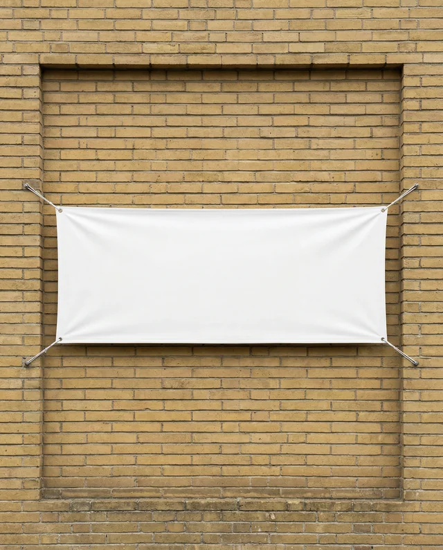 Blank White Banner Mockup on Yellow Brick Wall