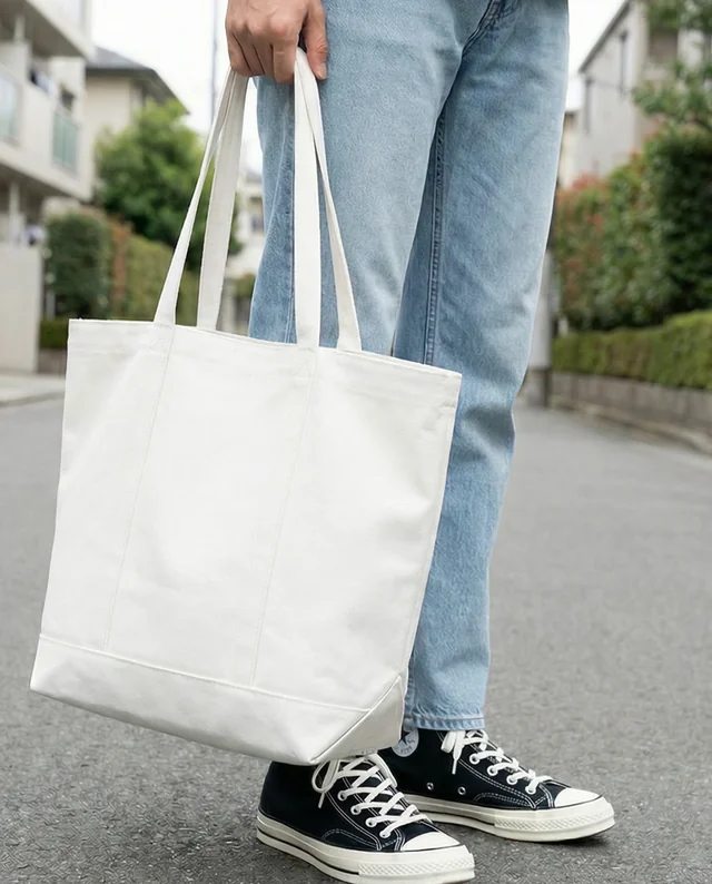 Stylish Mockup of a Canvas Tote Bag on Urban Street