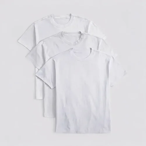 Mockup of T-Shirt Stack with Soft Gray Background Colors