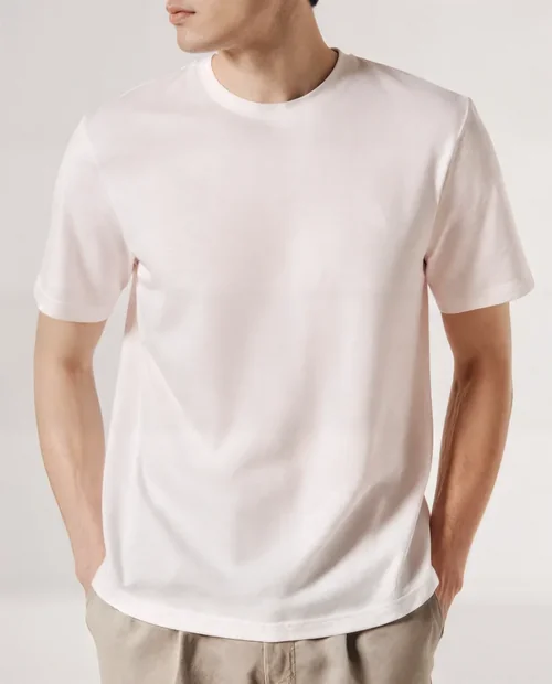 Stylish T-Shirt Mockup of a Young Man in Casual Wear