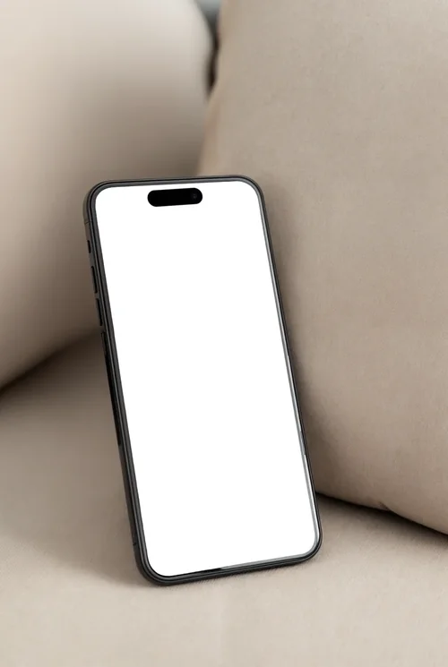 Modern iPhone 16 Pro Max Mockup on Beige Couch Surface