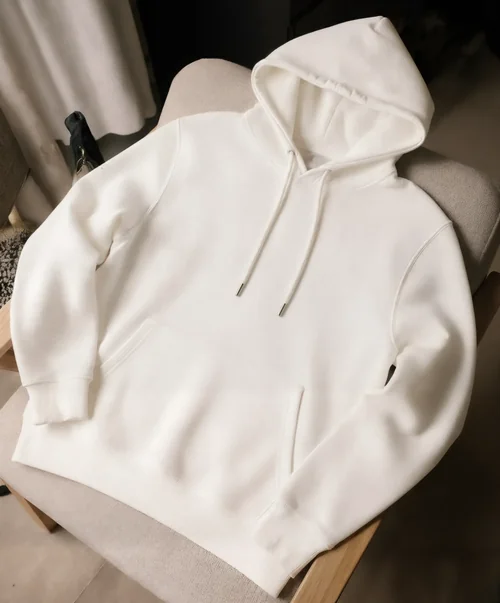 Stylish Hoodie Mockup on Modern Armchair