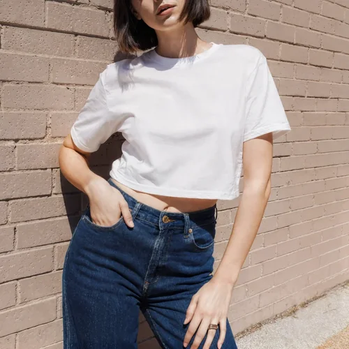 Stylish T-Shirt Mockup with Confident Young Woman