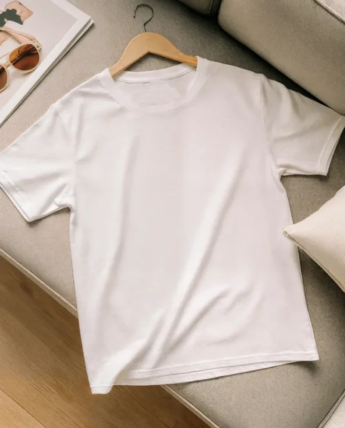 Minimalist T-Shirt Mockup on Cozy Beige Sofa