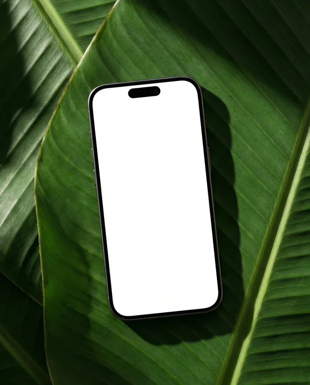Sleek iPhone Mockup on Tropical Leaf Background