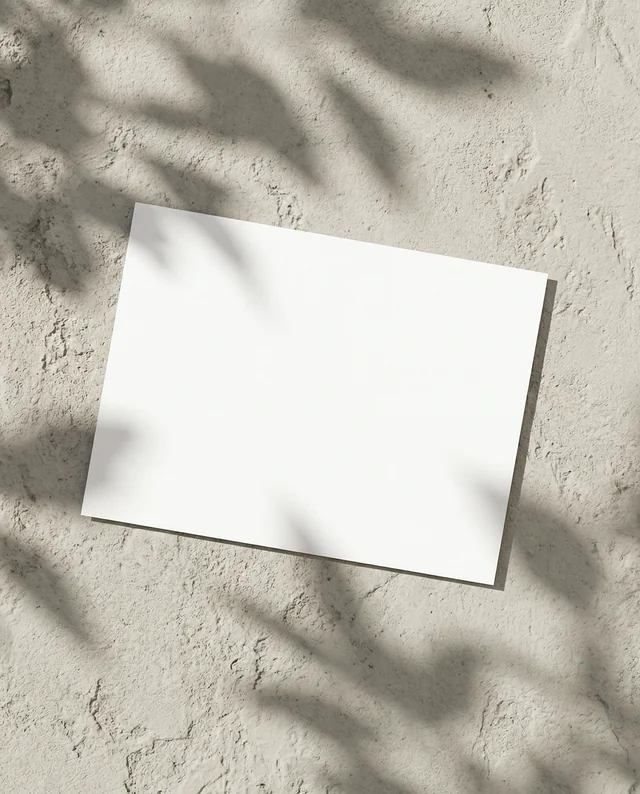 Minimalist Mockup of a Flyer on Textured Concrete Surface