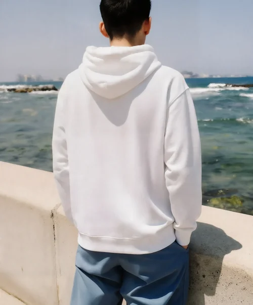 Stylish Hoodie Mockup by the Serene Coastal Walkway