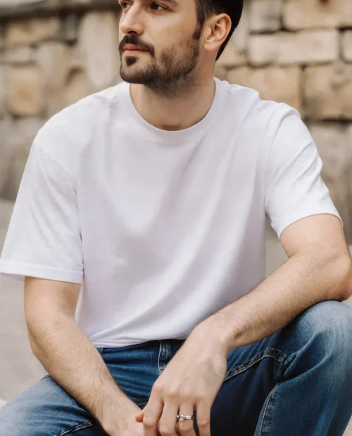 Casual T-Shirt Mockup of a Young Man in the City