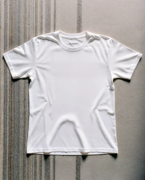 Minimalist T-Shirt Mockup on Textured Surface