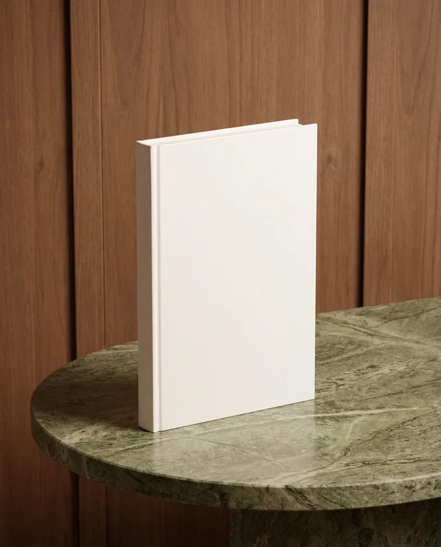 Elegant Mockup of a Blank Book on Marble Table
