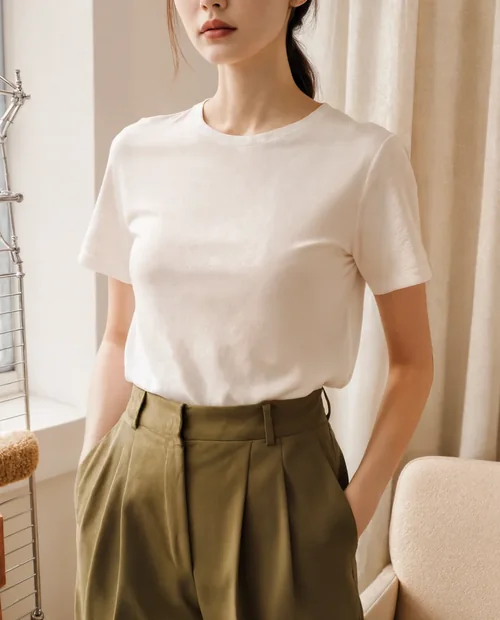 Stylish T-Shirt Mockup of Modern Woman in Minimalist Space