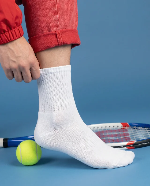 Close-Up Mockup of Socks with Red Denim and Tennis Gear