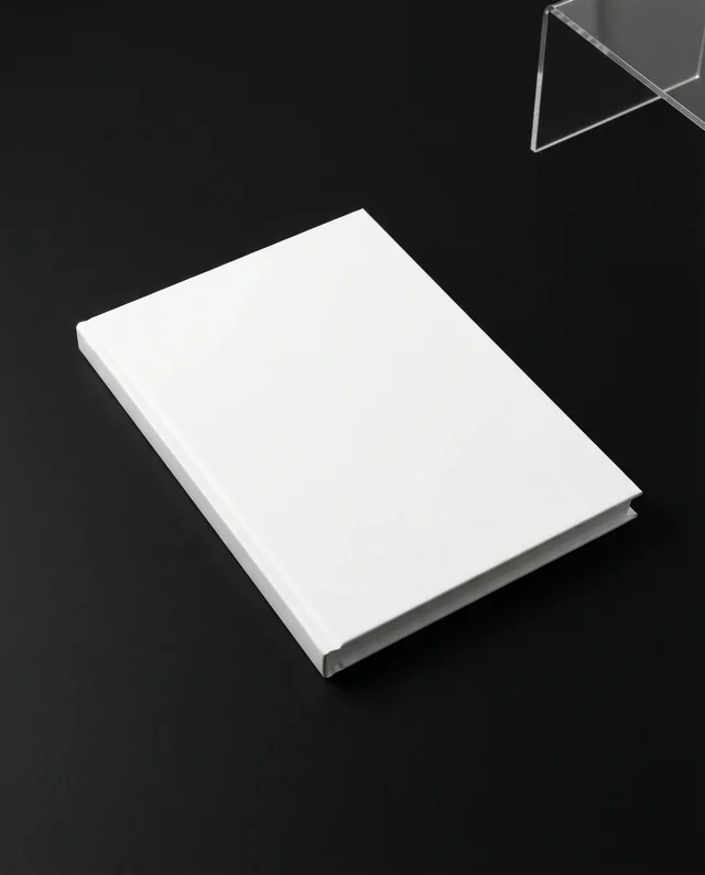 Minimalist Mockup of a Blank Book on Black Surface