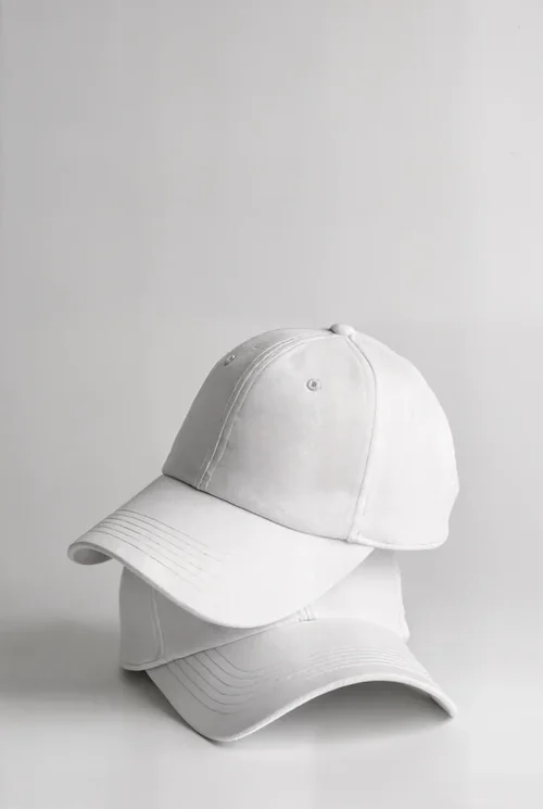 Elegant Mockup of Stacked White Hats for Showcase