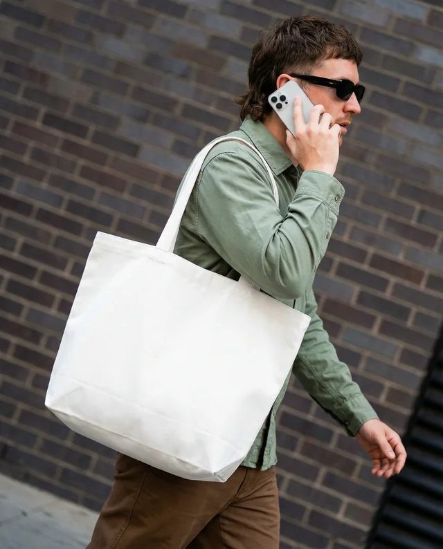 Stylish Mockup of a Young Man with Tote Bag