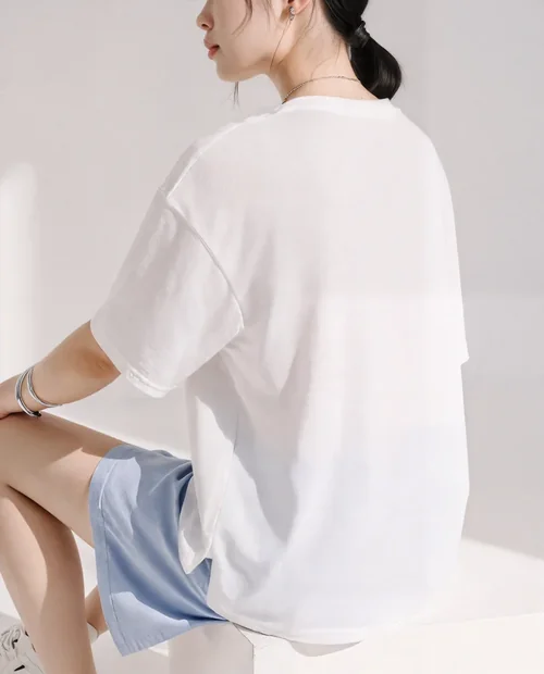 Stylish Mockup of T-Shirt on Young Woman