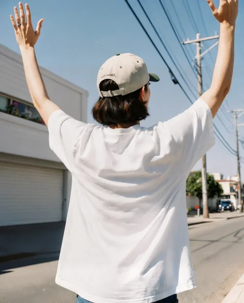 Joyful T-Shirt Mockup on a Sunlit Street Scene