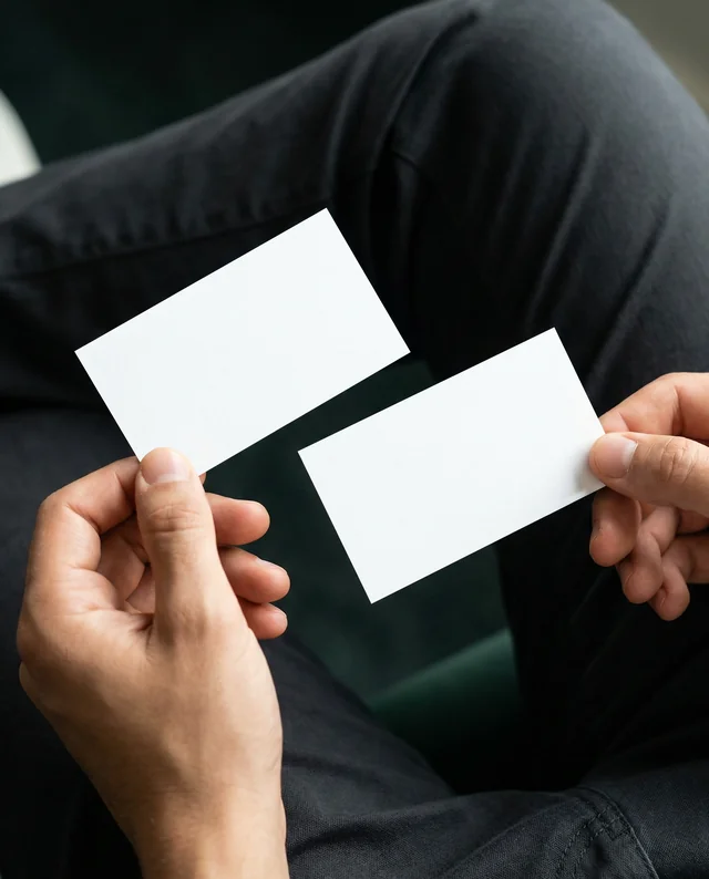 Elegant Mockup of Business Card Held in Relaxed Hands