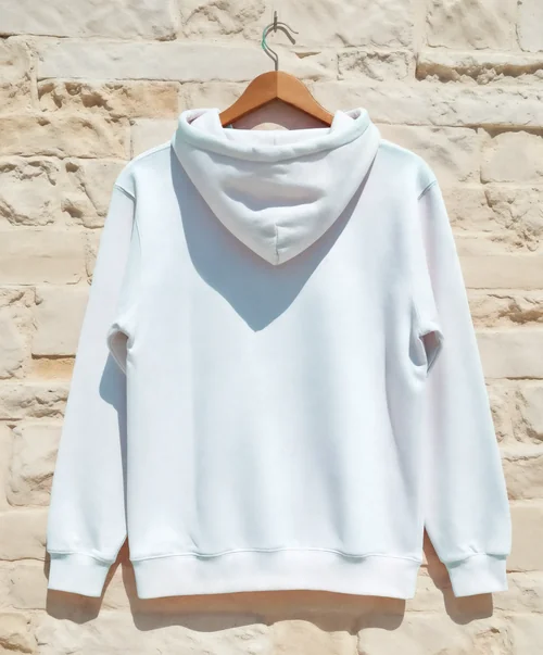 Simple White Hoodie Mockup Against Textured Wall