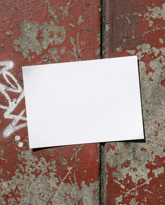 Minimalist Mockup of Flyer on Weathered Red Gray Surface