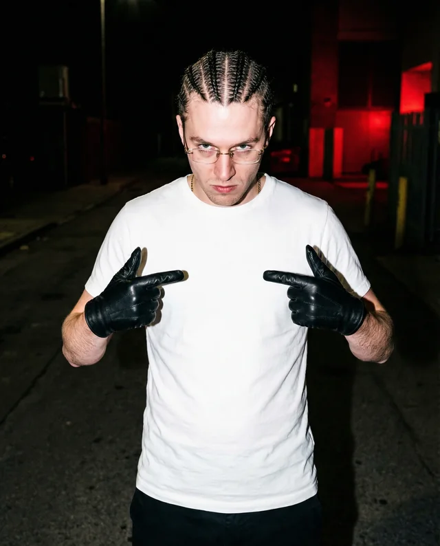 Urban T-Shirt Mockup of Confident Young Man