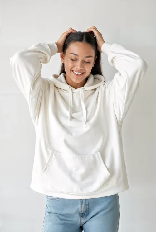 Joyful Young Woman in White Hoodie Mockup with Soft Colors