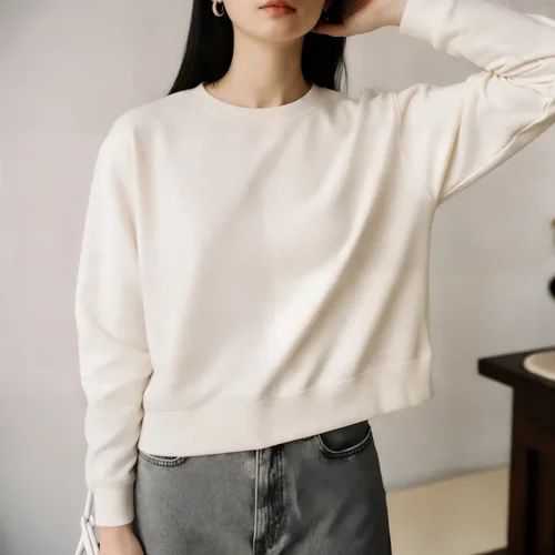 Stylish Mockup of a Woman in a Cream Sweatshirt