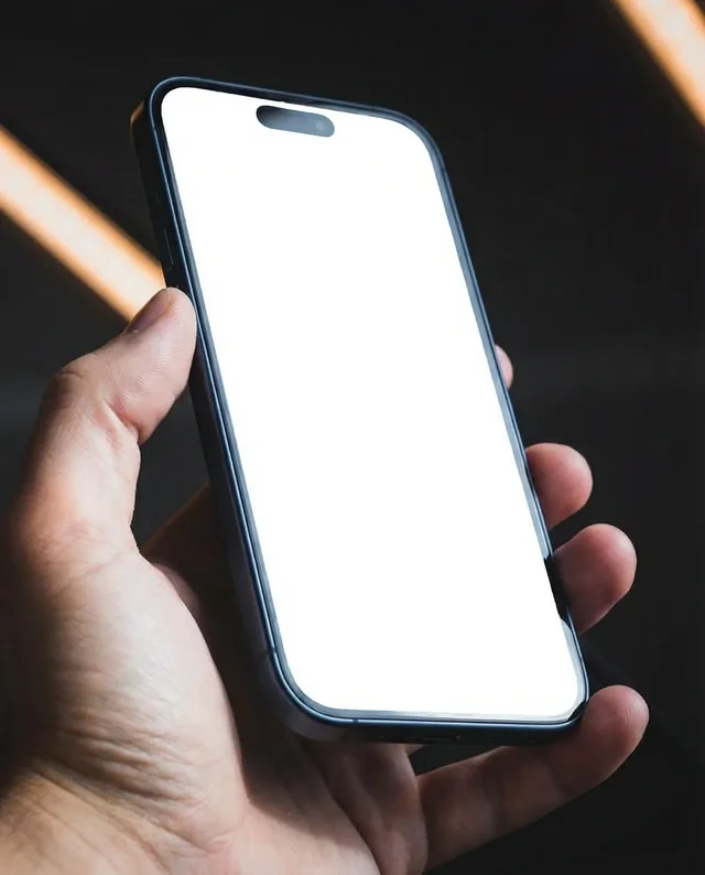 Sleek iPhone Mockup in Hand with Minimalist Design