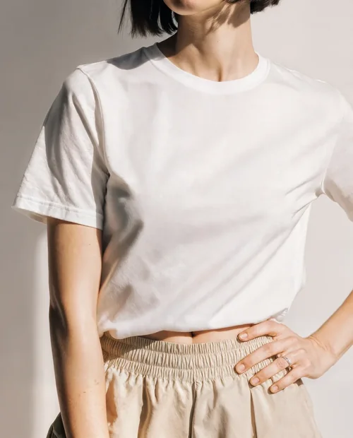 Stylish T-Shirt Mockup of Confident Young Woman