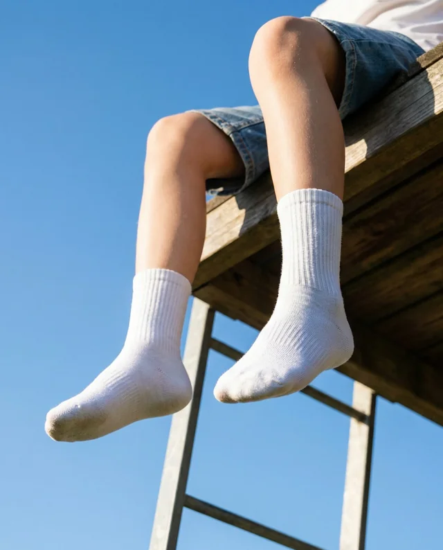 Cheerful Mockup of Child's Feet in Socks on Platform