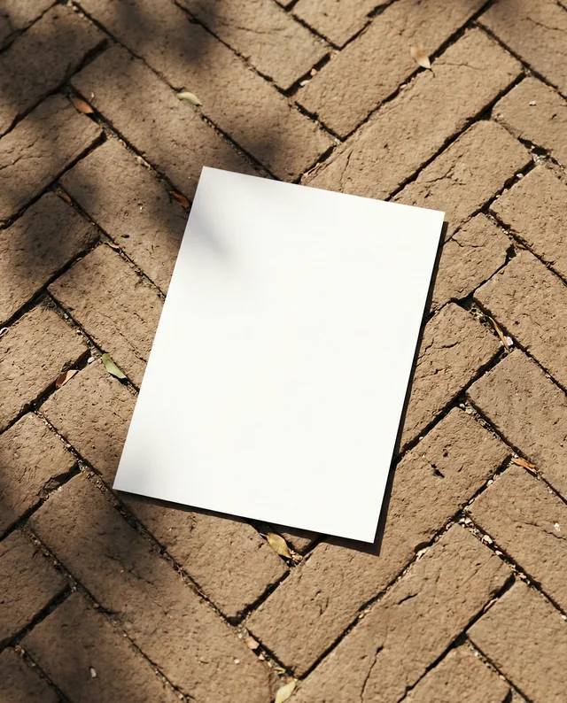 Minimalist Mockup of Flyer on Textured Brick Background