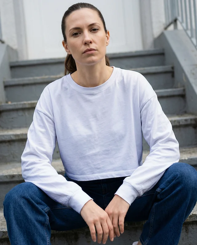 Urban Crop Top Mockup with Young Woman on Concrete Stairs