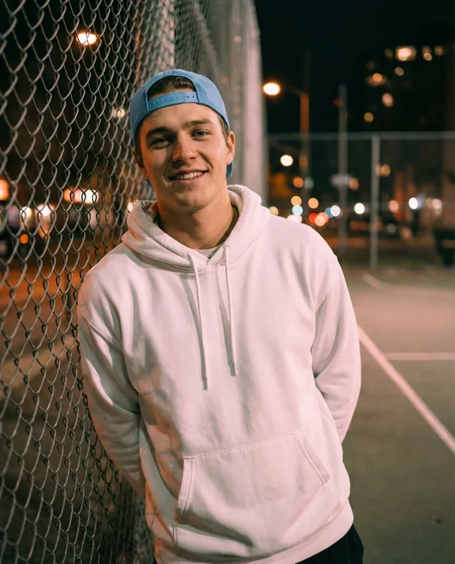 Stylish Hoodie Mockup of Young Man at Night