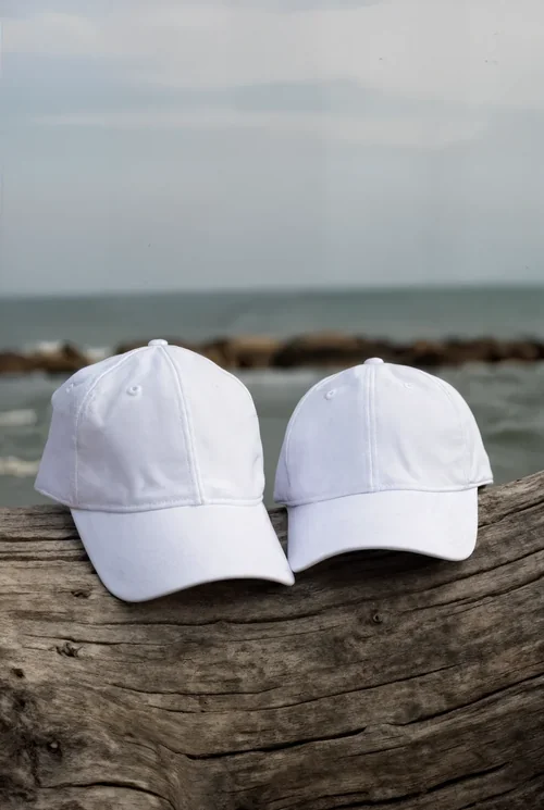 Stylish Hat Mockup on Rustic Beach Log