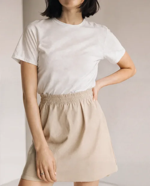 Stylish T-Shirt Mockup of Confident Young Woman