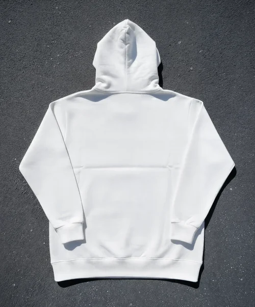 Mockup of a Cozy White Hoodie on Dark Surface