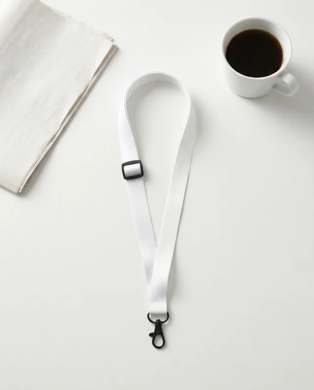 Minimalist Mockup of a White Lanyard and Coffee Cup