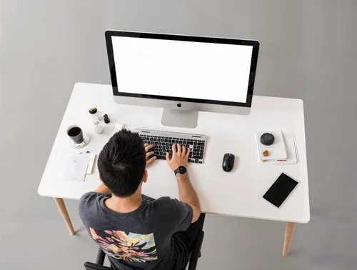 Modern iMac Mockup in a Minimalist Workspace Design
