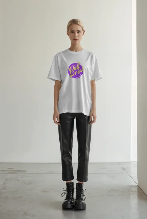 Chic T-Shirt Mockup Featuring a Confident Female Model