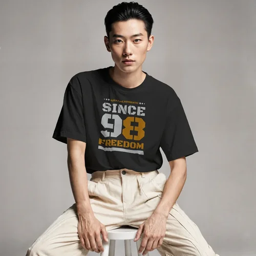 Mockup of T-Shirt on Model Against Soft Gray Background