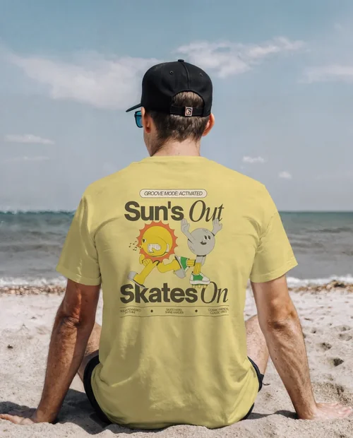 Mockup of Young Man in T-Shirt on Sandy Beach