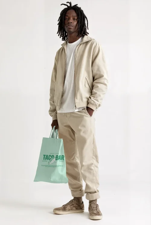 Stylish Mockup of a Tote Bag with Urban Fashion Model