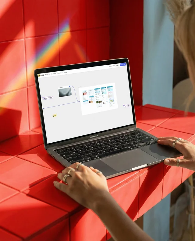 Stylish MacBook Mockup on Vibrant Red Tiled Surface