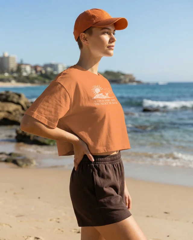 Stylish Mockup of a Woman in a Crop Top at the Beach