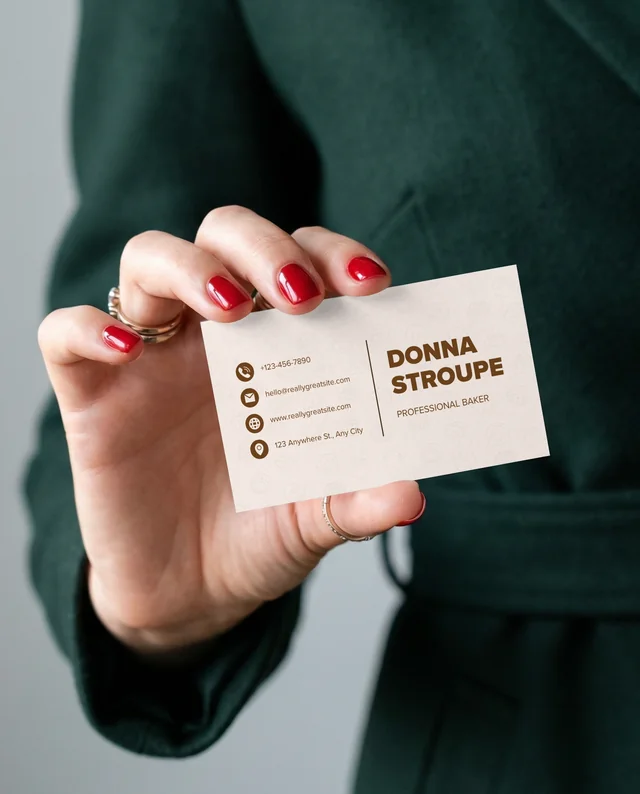 Elegant Mockup of a Woman's Hand Holding a Business Card