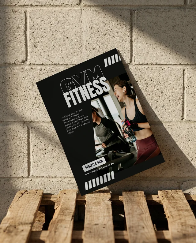 Elegant Mockup of a Crumpled Flyer Against Concrete Wall